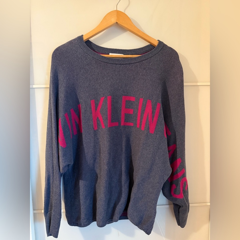 Calvin Klein Jeans Blue Knit Sweater with Fuchsia Logo & Bat Style Wings